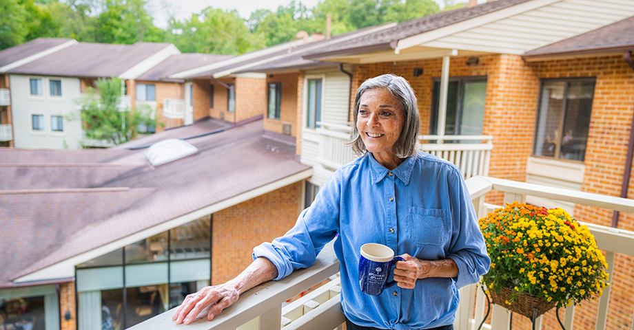 resident on apartment balcony